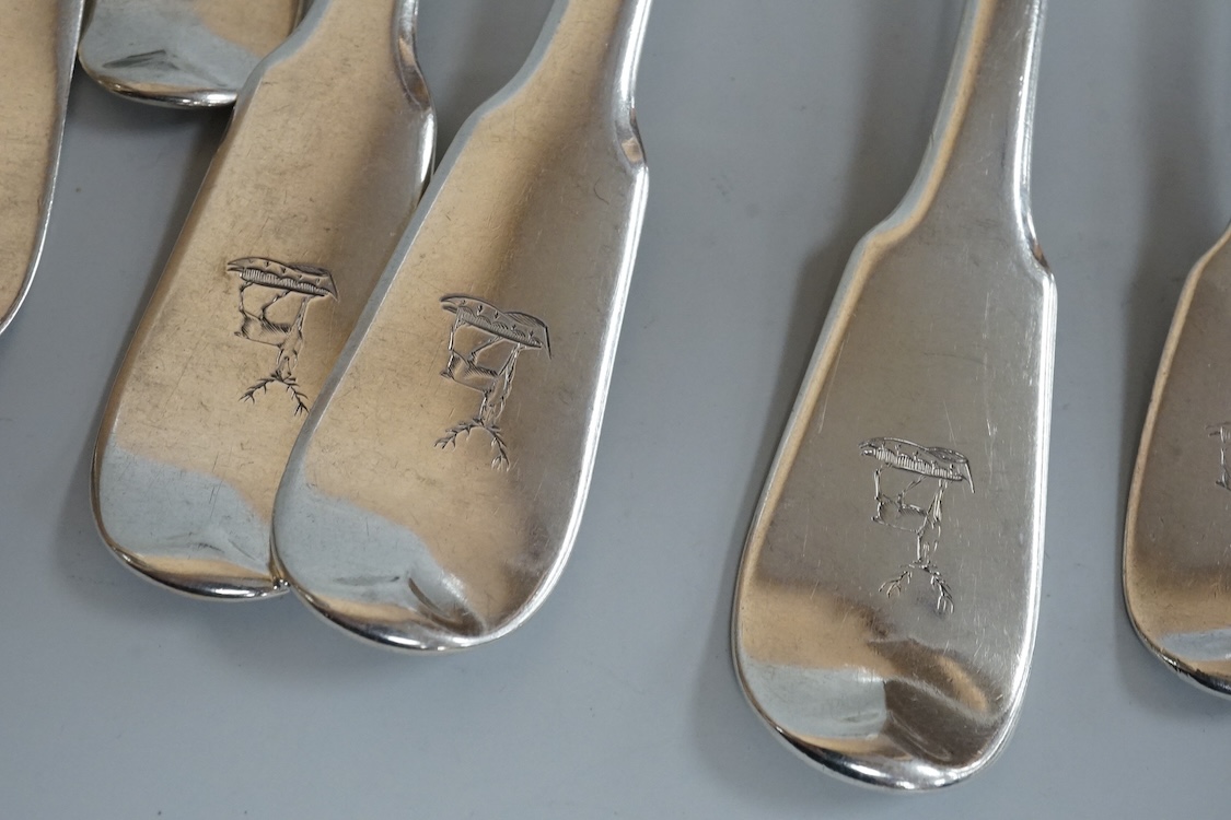A set of six late George III silver fiddle pattern table forks, Thomas Wilkes Barker, London, 1818, together with five 19th century assorted silver fiddle pattern dessert forks, one broken in half, 18.8oz.
